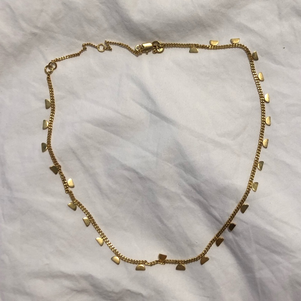 Gold made well necklace
